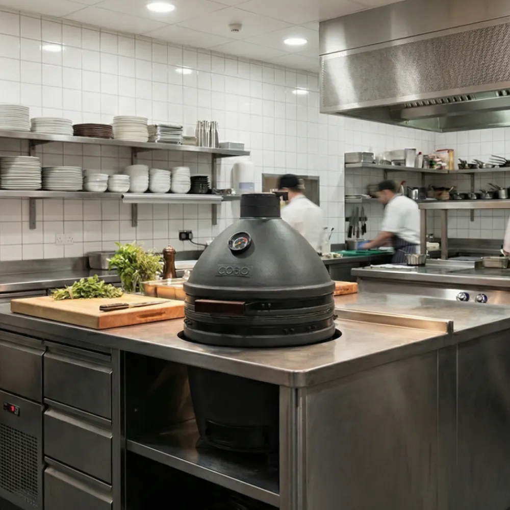 COEO Quatro Large ceramic kamado in black to replace a gas barbecue